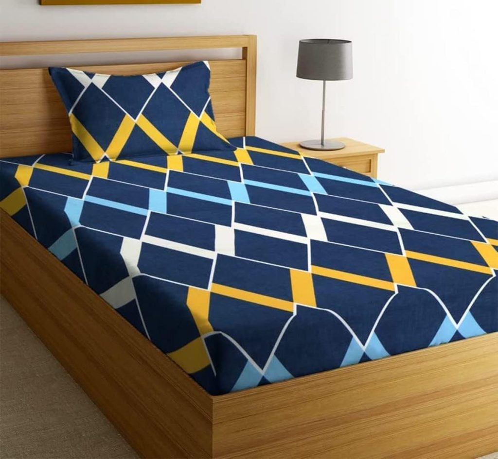 blue color single cotton bedsheet with sky blue, white and yellow zigzag